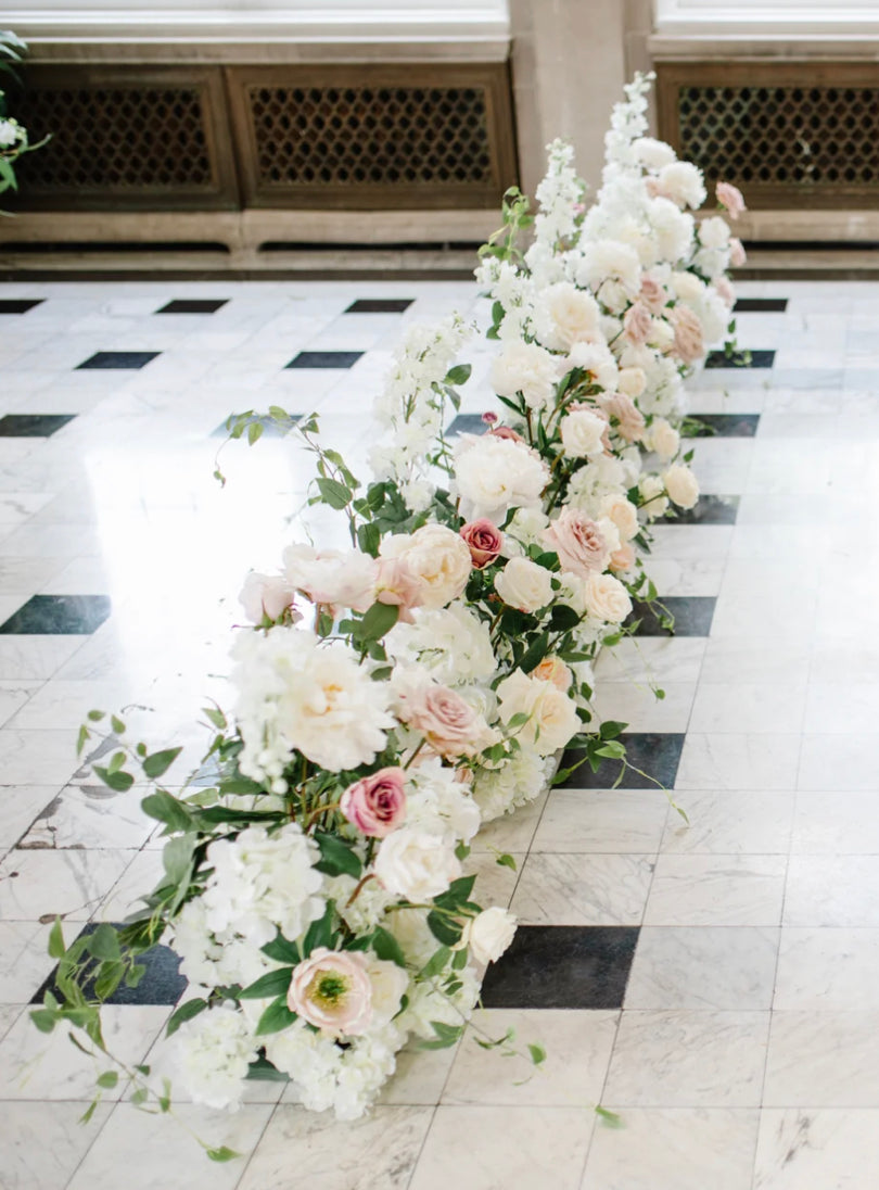 These aisle flowers are made with beautiful soft blush garden roses, ballet pink dahlias, soft blush peonies, white garden roses, white playa blanca roses, blush ranunculus, mauve roses, ivory hydrangeas, blush sweet pea's, white ranunculus, and white delphinium, with touches of eucalyptus, peach juliet garden roses, and clematis. 