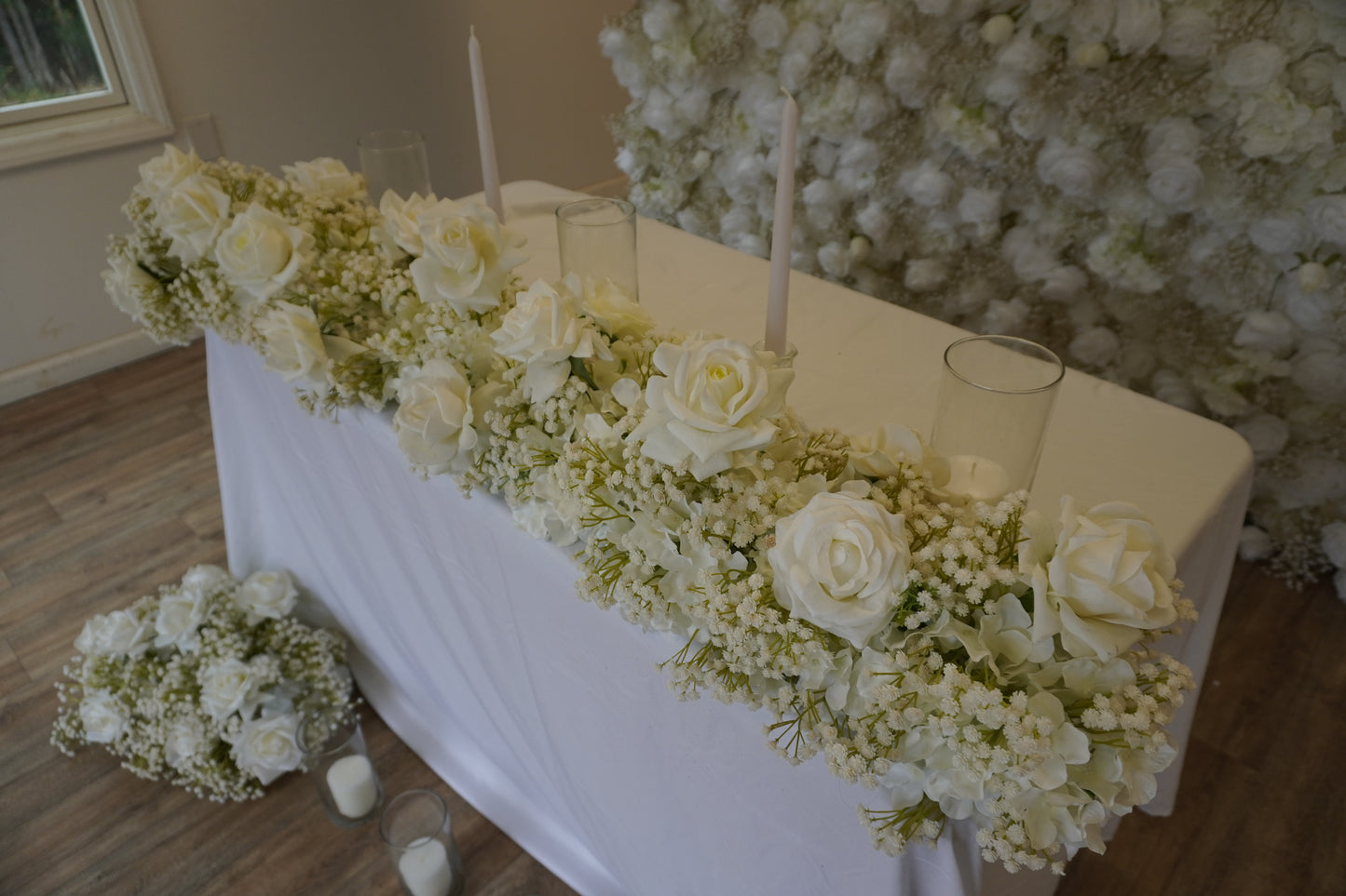 white rose and babys breath wedding table decorations with candles. 